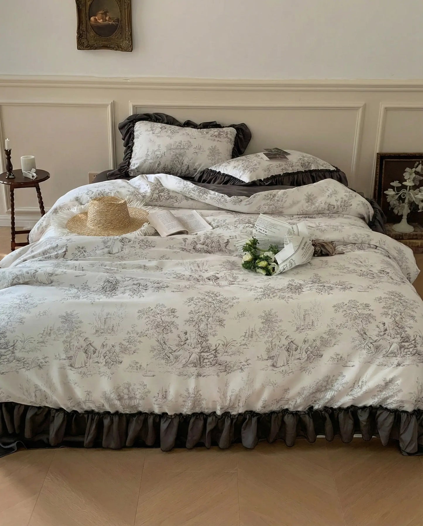 Full bed view of ivory toile duvet cover with charcoal ruffle skirt, elegant vintage bedroom decor