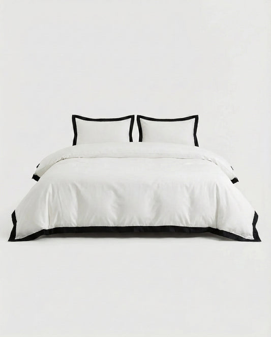 White duvet cover set with black trim studio image showing clean lines and modern bedding design