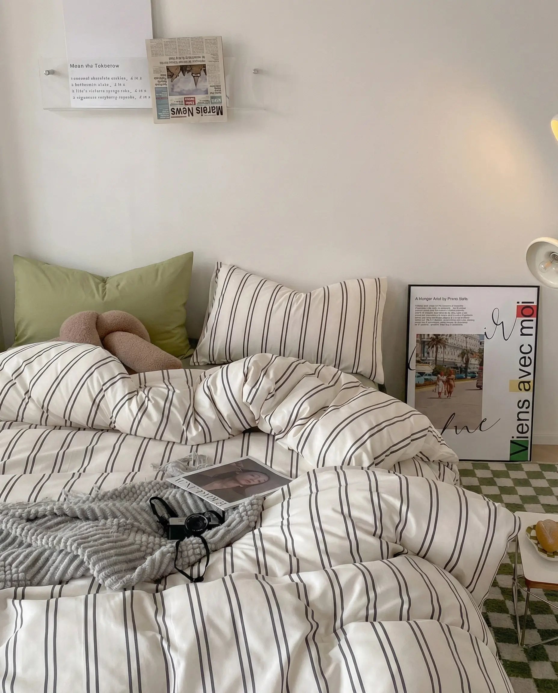 Modern striped duvet cover styled in a cozy bedroom with warm accents, blending simplicity and comfort for everyday living.