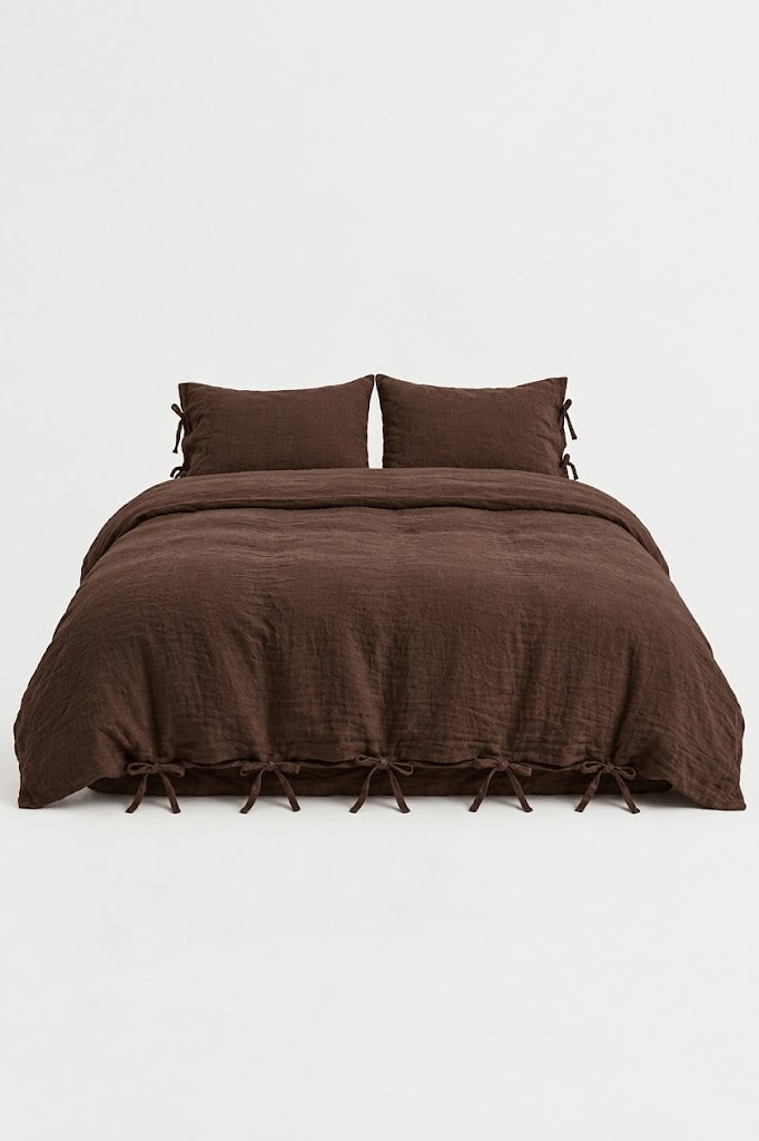 Chocolate Espresso Muslin Cotton Duvet Cover Set by DORMÉ Studio with bow tie closures, front view on white background