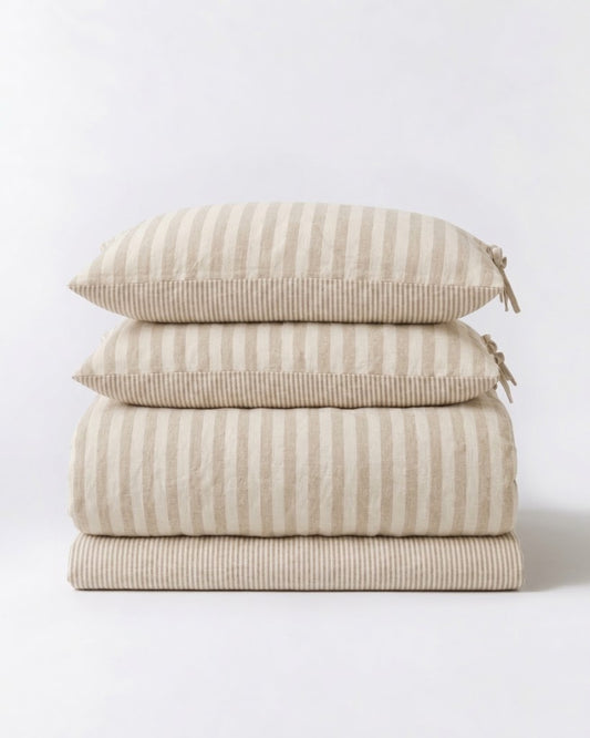 Folded Sable Stripe Duvet Cover Set with striped pillowcases, pinstripe reverse and matching pinstripe flat sheet