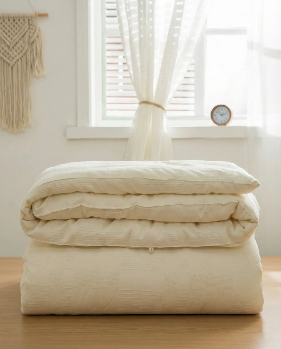 The organic soybean-fiber duvet insert, folded to show its cotton shell