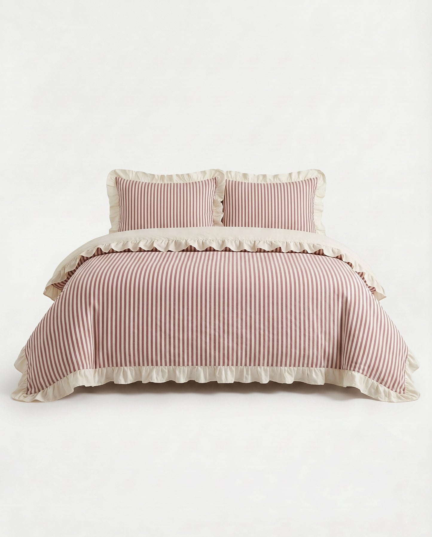 Front view of blush pink striped cotton duvet cover set with ivory ruffle trim and elegant minimalist bedding design