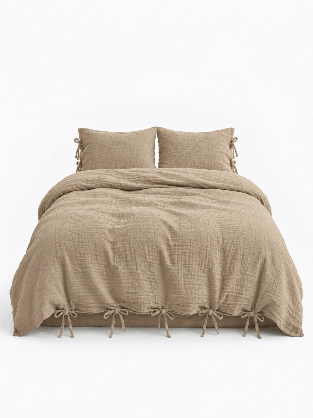 Natural Oat muslin cotton duvet cover set by DORMÉ Studio with bow tie closures, front view on white background