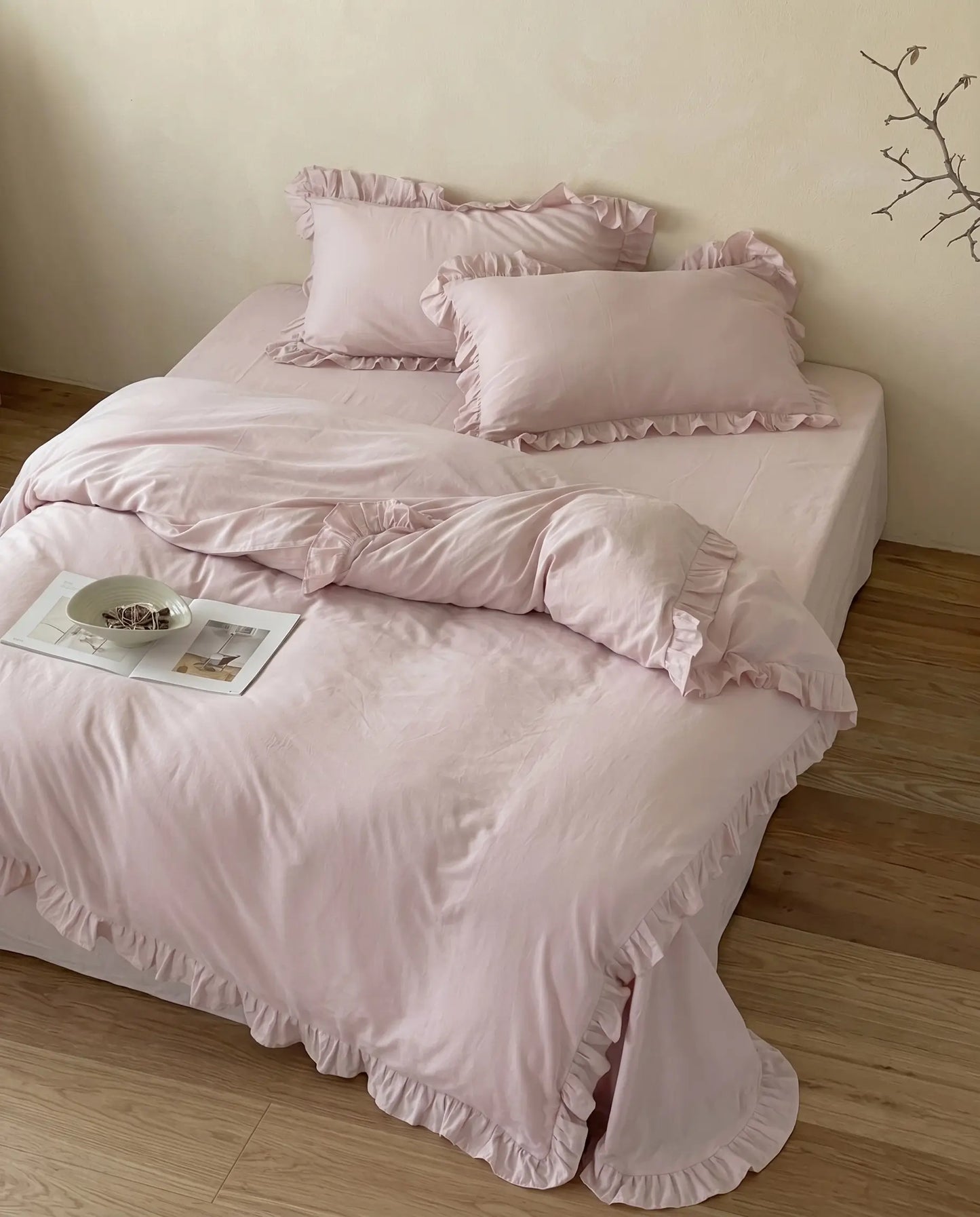 Wide bedroom view of the Rosalie blush pink ruffle duvet cover set with elegant feminine bedding and soft neutral aesthetic styling