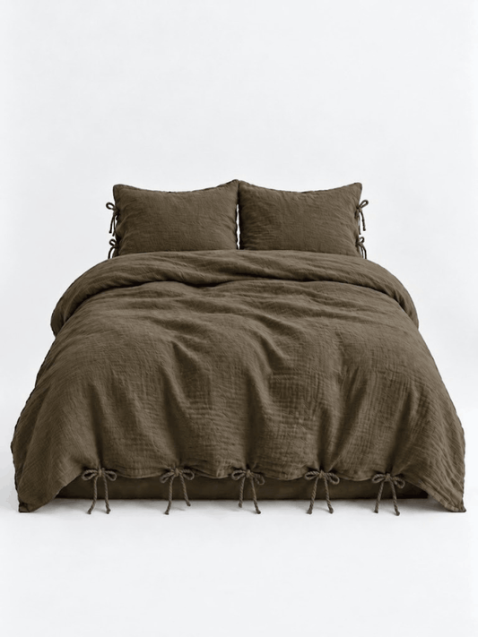 Truffle muslin cotton duvet cover set by DORMÉ Studio with bow tie closures, front view on white background