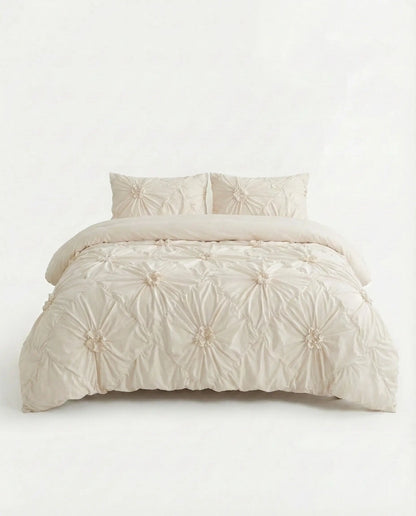 Cream tufted floral duvet cover set studio image, aesthetic bedding, luxury duvet cover, dorm room decor, neutral bedding set, textured floral duvet, elegant bed styling, modern bedroom, cozy bedding, minimalist home