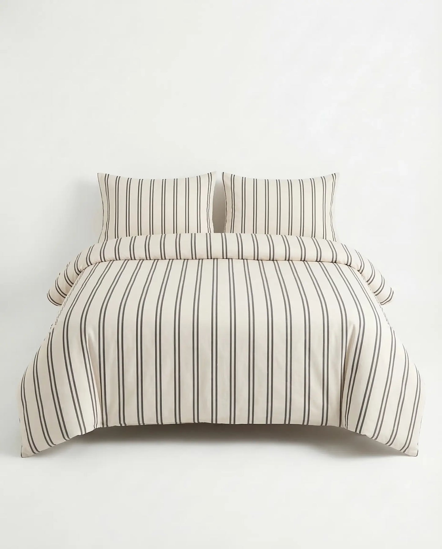 Urban Stripe cotton duvet cover set with thin black stripes on cream bedding and matching pillow shams by DORMÉ Studio